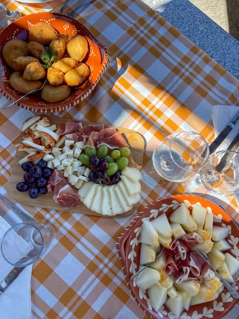 Douro Valley: Olive Oil & Wine Tour with Boat & Lunch - Traditional rabelo boat cruise between terraced vineyards