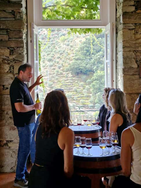 From Porto: Premium Douro Valley 4 Vineyards Tour with Lunch - Stop 1: your first winery experience, tasting in a working vineyard setting