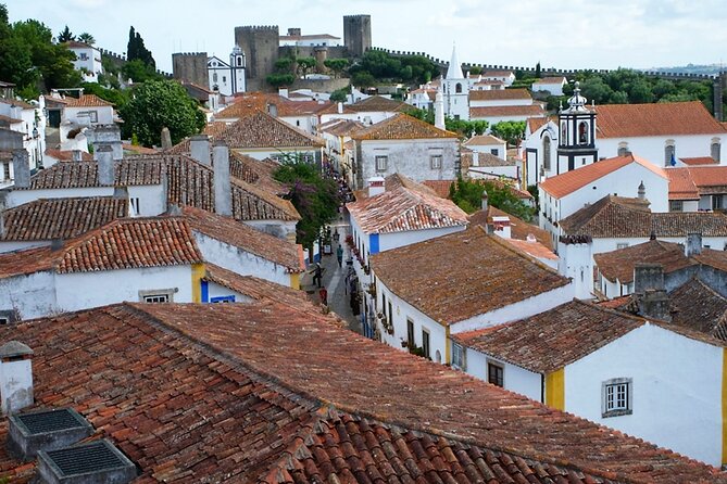 One way Douro Valley to Lisbon through Coimbra and Óbidos - Lisbon area drop-off in Cascais and Sintra zones