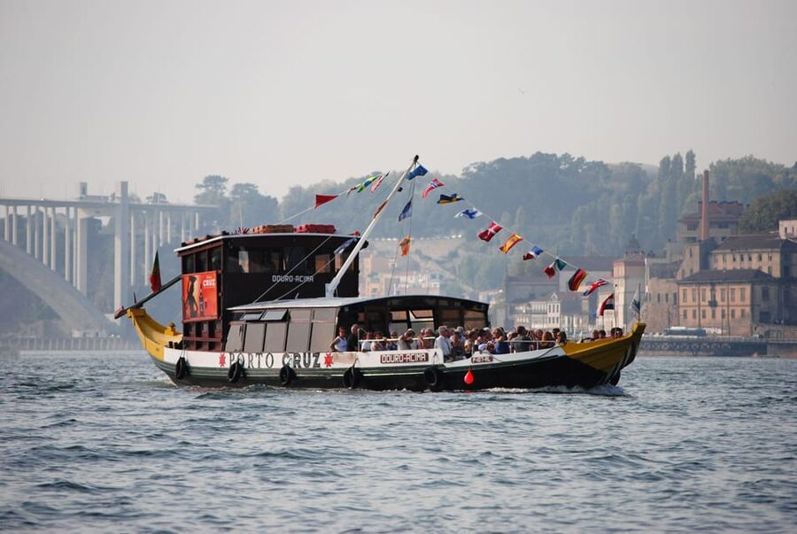 Porto: City Center Eco Car e Cruzeiro Rio Douro - Ribeira, Gaia Pier, and the Included 6 Bridges Douro Cruise