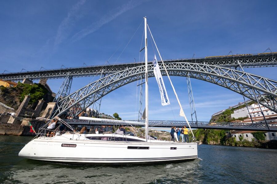Porto: Daytime or Sunset Douro River Cruise With Port Wine - Dom Luis I Bridge: the moment Porto turns cinematic