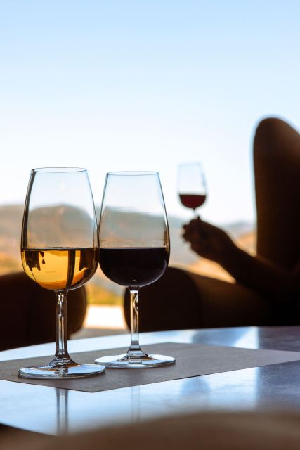 Porto: Douro Valley Full-Day Boat, Train, and Lunch Tour - Quinta winery tour and wine tasting that focuses on place