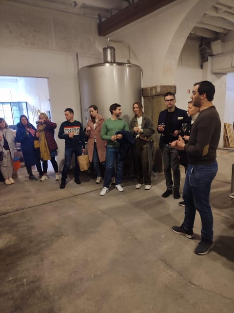 Porto: Port and Douro Wine Walking Tour with 9 Tastings - Meeting at Posto de Turismo, Then Keeping the Walk Easy