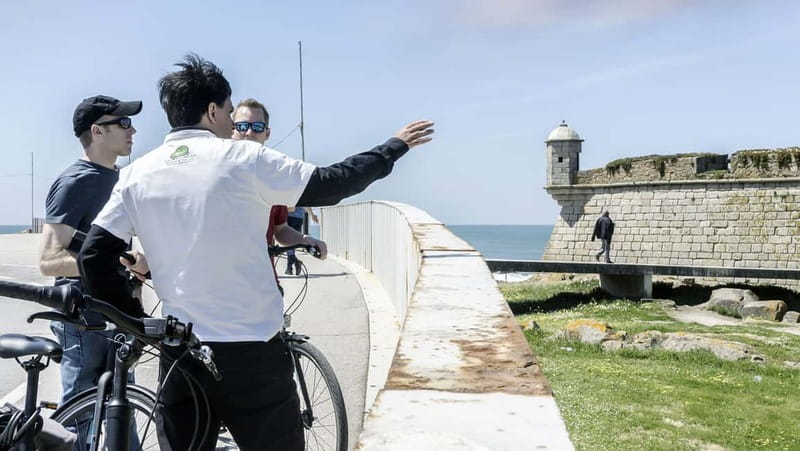 Porto Private E-Bike Tour: Douro River, Parks & Beaches - Arrábida Bridge and Tripeiros monuments: iconic Porto, at bike speed