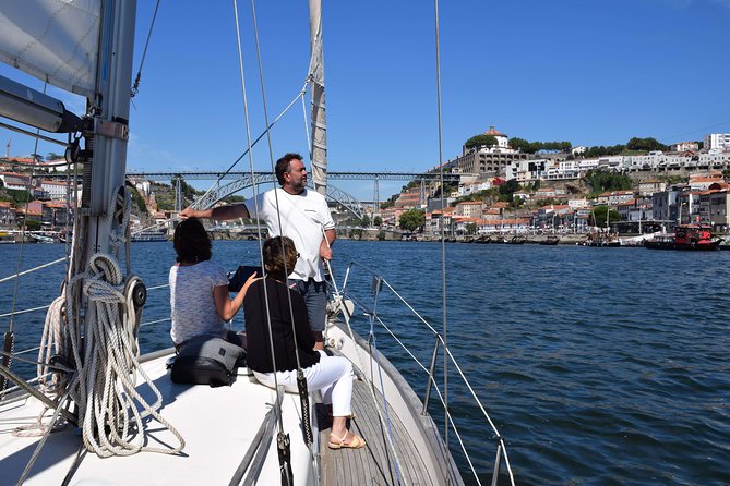 Private Douro River Sailing Cruise (Sunset Available) - Arrábida Bridge, Massarelos church, and Porto’s trade-side details from the water