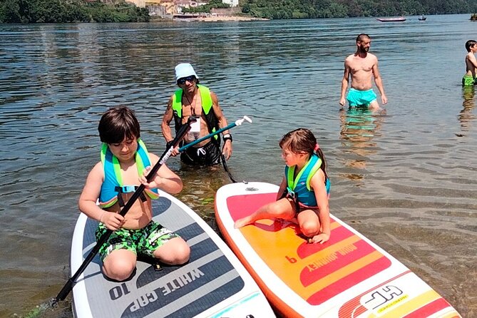 Stand Up Paddle discovering desert beaches of Douro River - Pick Up included - Guide navigation plus rental gear means less fuss on the water